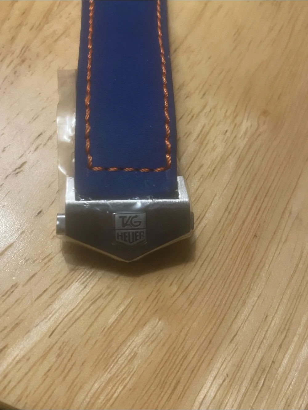 New Tag Heuer Blue Dial Watch with Orange Accents